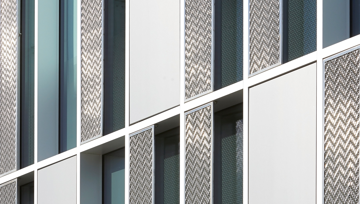 The Impact of Vertical Fins Façade on Building Performance: A New