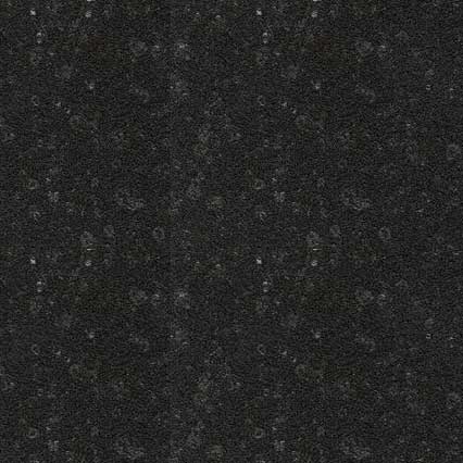 A dark speckled texture with small white and light-colored dots scattered across a black or very dark gray background, resembling granite or similar stone material.