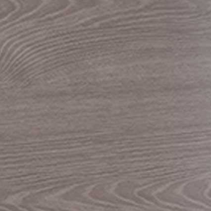 A close-up view of wood grain texture showing natural curved lines and patterns in a muted brown or taupe color, likely from a wooden surface or flooring material.