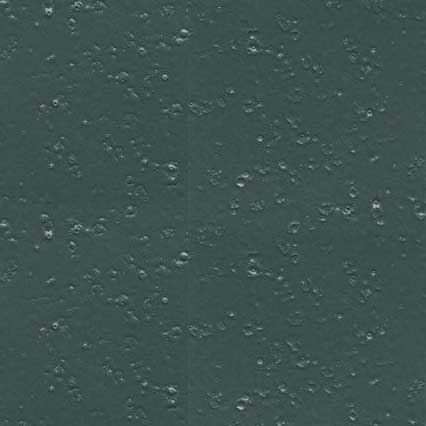 A dark green textured surface with numerous small white or light-colored spots scattered randomly across it, resembling water droplets on a painted or coated material.