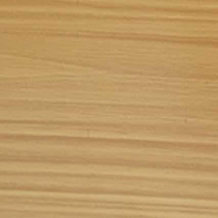 Light-colored wood surface with horizontal grain lines running across the entire frame, displaying natural wood texture in warm beige and tan tones.