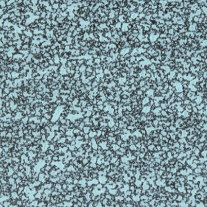 A densely speckled blue-gray textured surface with small dark spots scattered uniformly across it, resembling granite or a similar granular material.