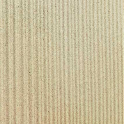 A textured beige or tan colored surface with vertical ribbed lines running from top to bottom, resembling corrugated cardboard or similar ridged material.