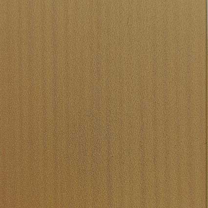 A textured brown leather or fabric surface with a uniform, fine-grained pattern in warm tan and beige tones.