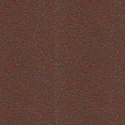 A textured surface with a reddish-brown base color featuring scattered small dark specks and dots throughout, resembling a speckled material or aggregate surface.