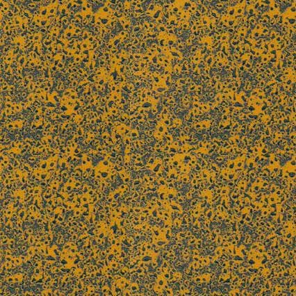 A textured surface with an orange or golden yellow background covered in dense, irregular dark speckles and spots creating a mottled pattern throughout.