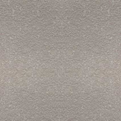 A textured surface with a mottled gray-beige pattern, resembling concrete, stucco, or painted wall texture with fine granular details throughout.