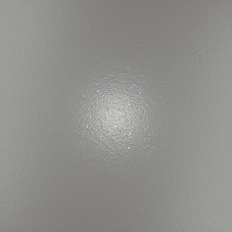 A textured white or light gray surface with a subtle pebbled or leather-like pattern, featuring a bright circular light reflection in the center that creates a radial highlight effect.