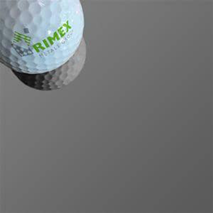 A white golf ball with green 