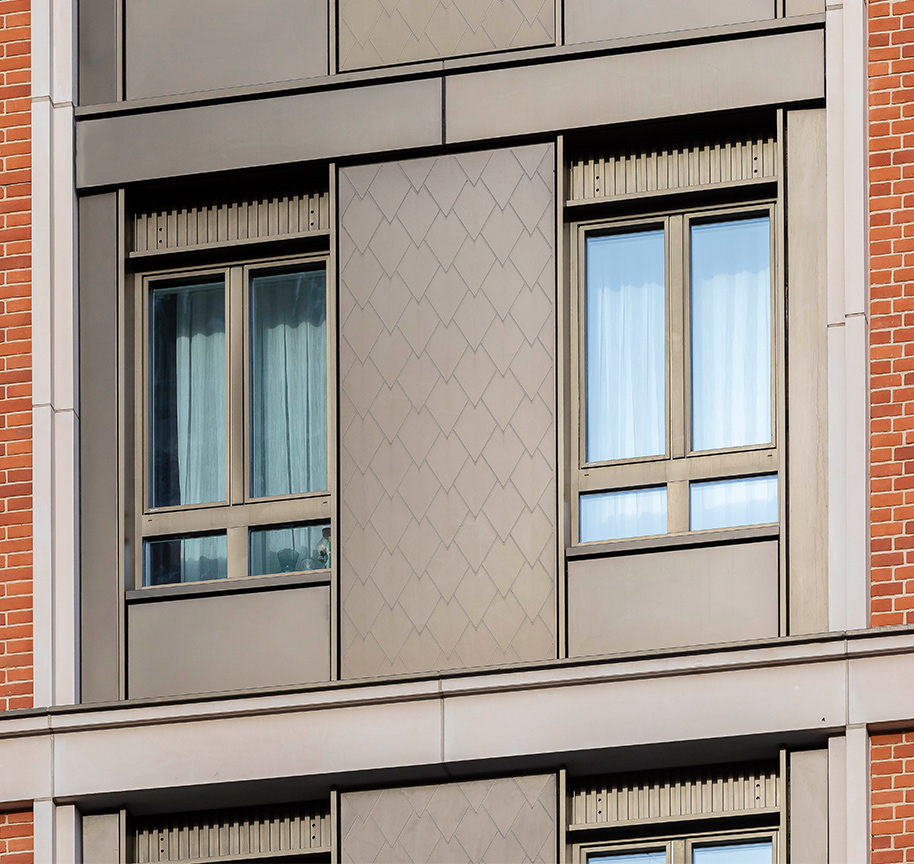 Routed tray panel cladding