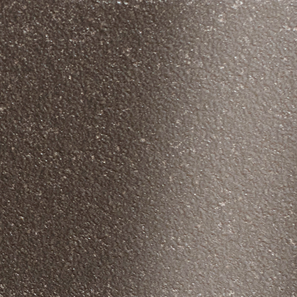 A textured brown or bronze metallic surface with a fine, granular pattern that creates subtle light reflections across the material.
