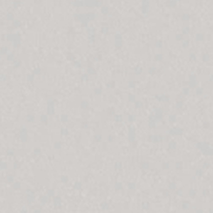A plain light gray or beige colored background with no visible text, objects, or other content.